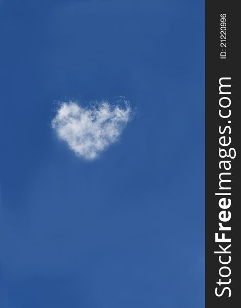 Cloud with heart shape on clear blue sky background. Cloud with heart shape on clear blue sky background