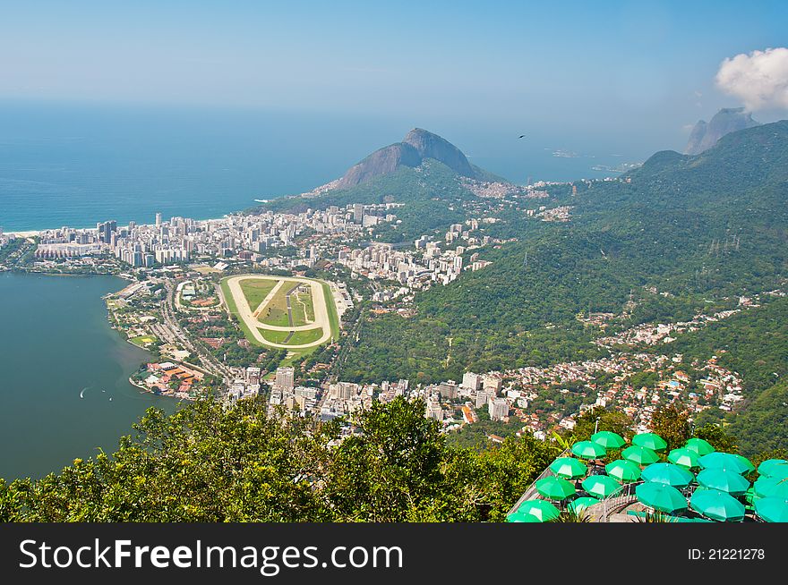 Panoramic view of the city,ocean and racetrack from Corcovado Mountain. Panoramic view of the city,ocean and racetrack from Corcovado Mountain.