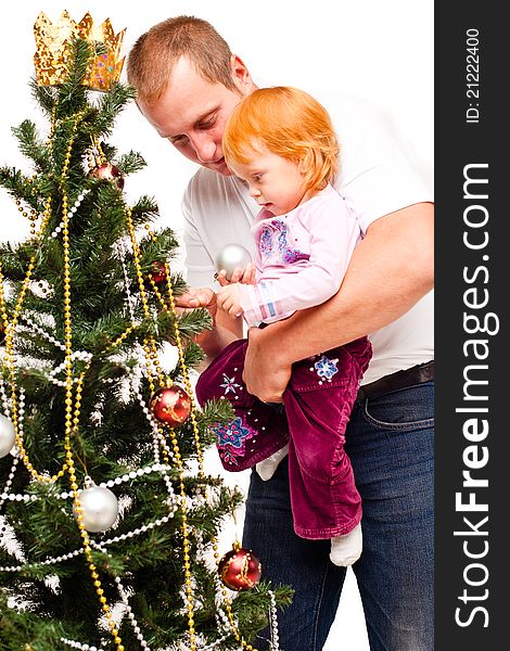 Dad with daughter decorate a new-year tree on a white background