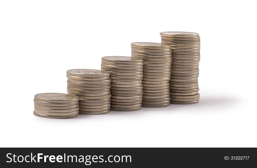 Silver and gold coins on a white background. Silver and gold coins on a white background