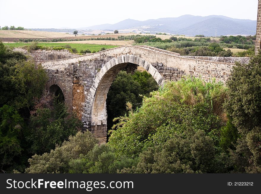 Medieval bridge located in Italy. Medieval bridge located in Italy.