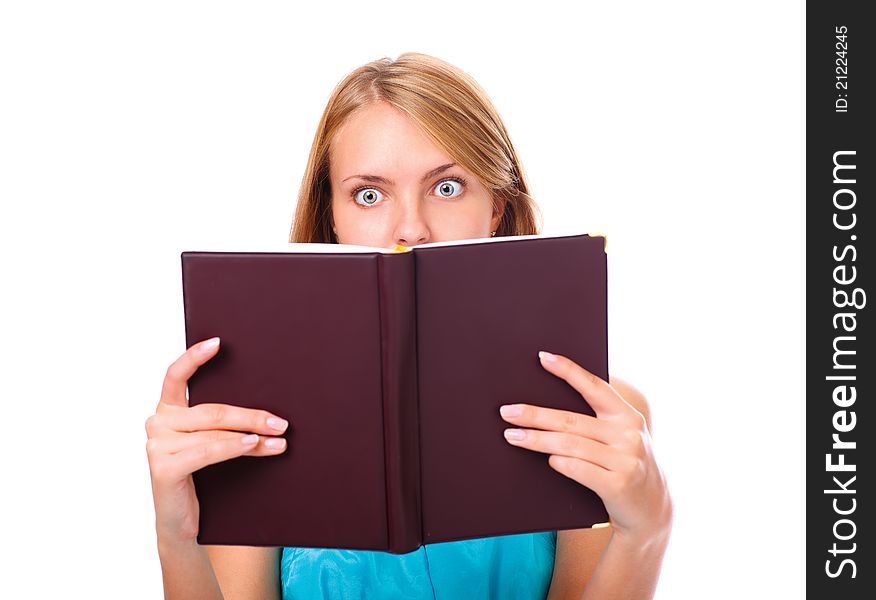 Portrait of young woman amazed by what she is reading isolated