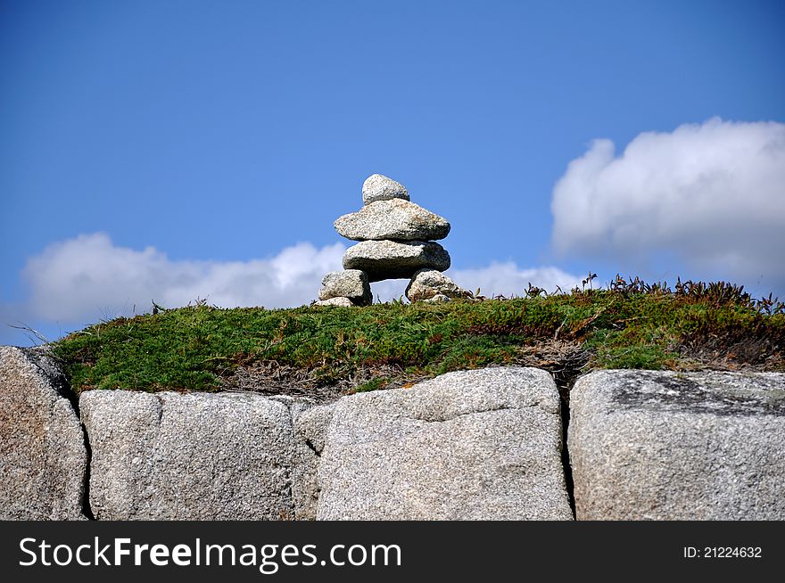Stone Pile near Peggys Cove with blue sky, Nova Scotia, Canada