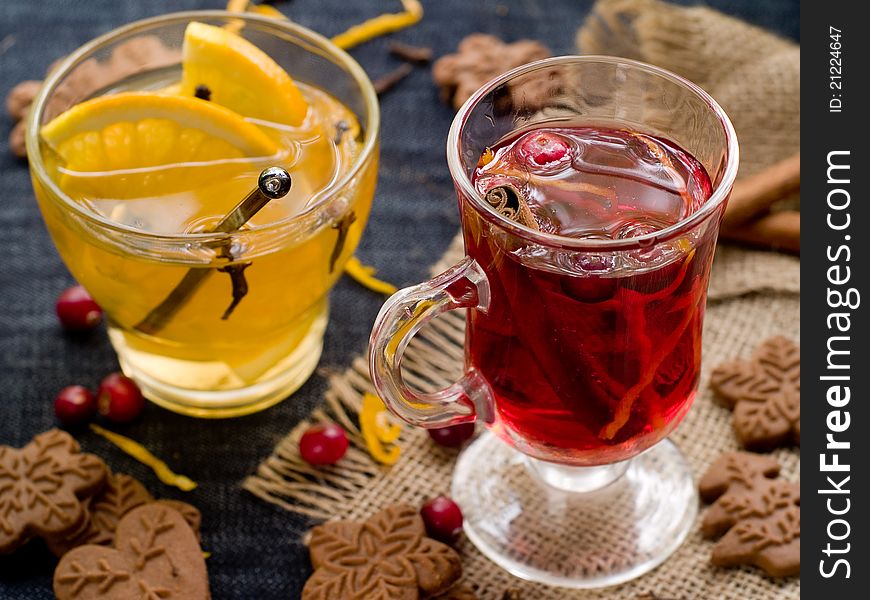 Hot drinks with cranberries and orange. Selective focus