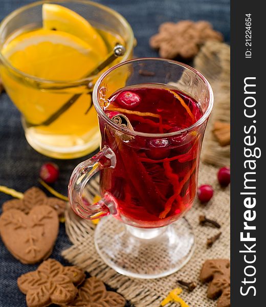 Hot drinks with cranberries and orange. Selective focus