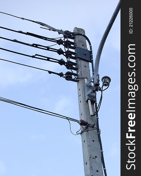 Electric pole on blue sky