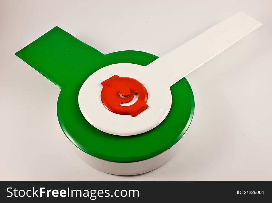 Modern clock with green needle on white background
