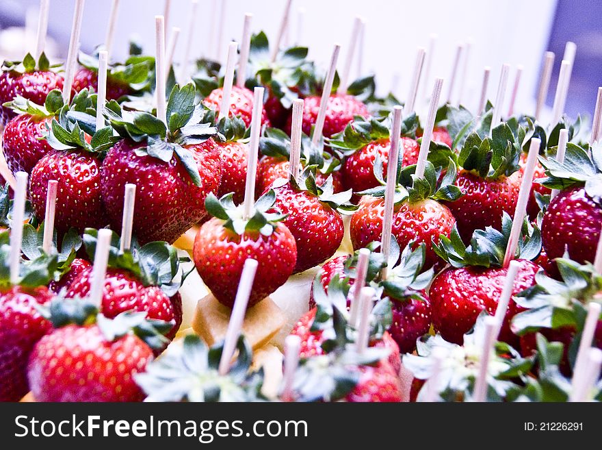 A macro view of assorted strawberries
