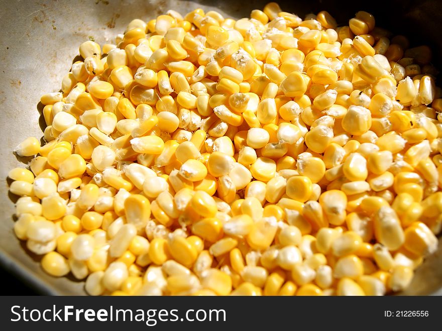 The golden corn grain, in the market to sell. Corn grains can be made into many delicacies, is green health food.