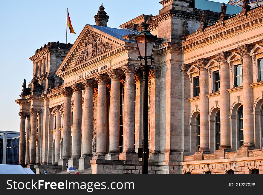 Reichstag building in Berlin at sunset