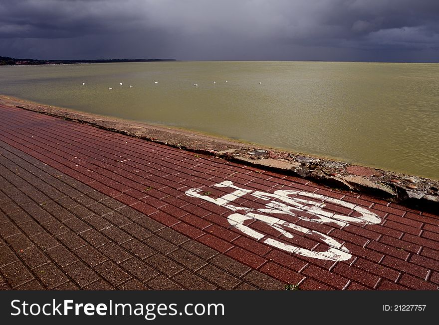 Bicycle track on the sea bay