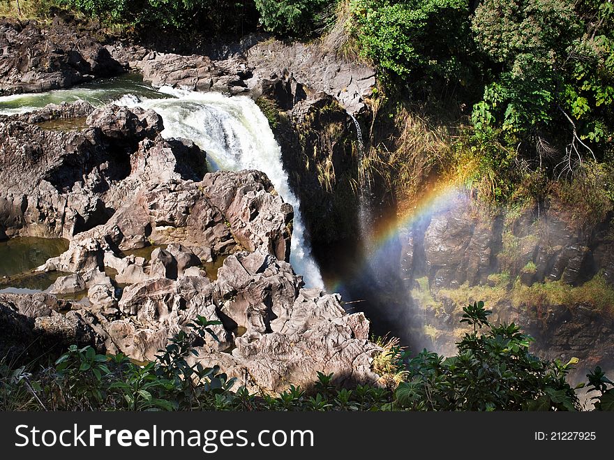 Rainbow Falls, waterfall on the Big Island of Hawaii. Rainbow Falls, waterfall on the Big Island of Hawaii.