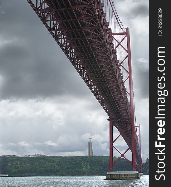 Bridge of 25 April, Portugal, Lisboa. Bottom-up view from the coast.