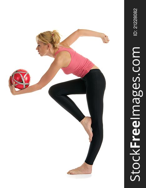 Woman Standing With The Ball Makes The Exercise