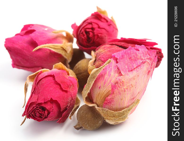 Heap of tea roses isolated on a white background. Heap of tea roses isolated on a white background.