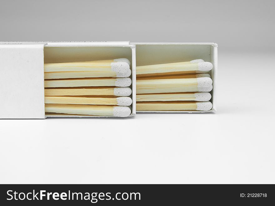 2 box of matches with a white gray on a white background