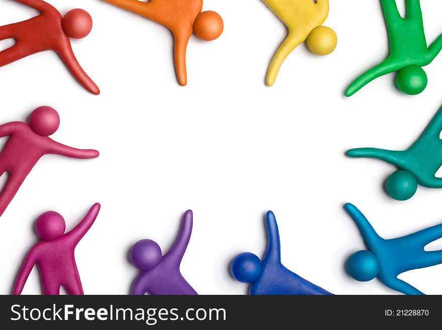 Multicolored plasticine human figures on a white background. Multicolored plasticine human figures on a white background