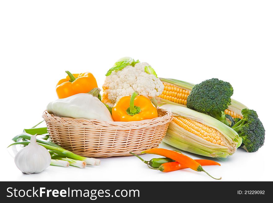 Still-life of autumn harvest with yellow and green colors on isolated white background. Still-life of autumn harvest with yellow and green colors on isolated white background