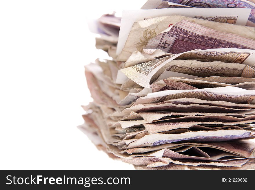 Stack of Chinese currency close-up isolated on the white