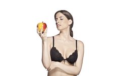 Beautiful Woman Posing With An Apple Stock Photography