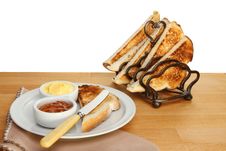 Toast And Marmalade On Worktop Stock Photos