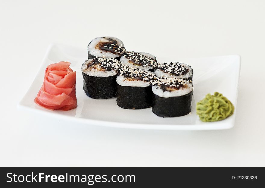 Sushi on plate tobico wassabi eel japan food. Sushi on plate tobico wassabi eel japan food