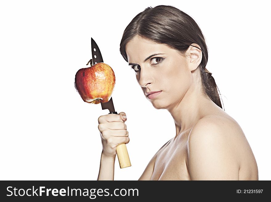 Woman with knife and apple