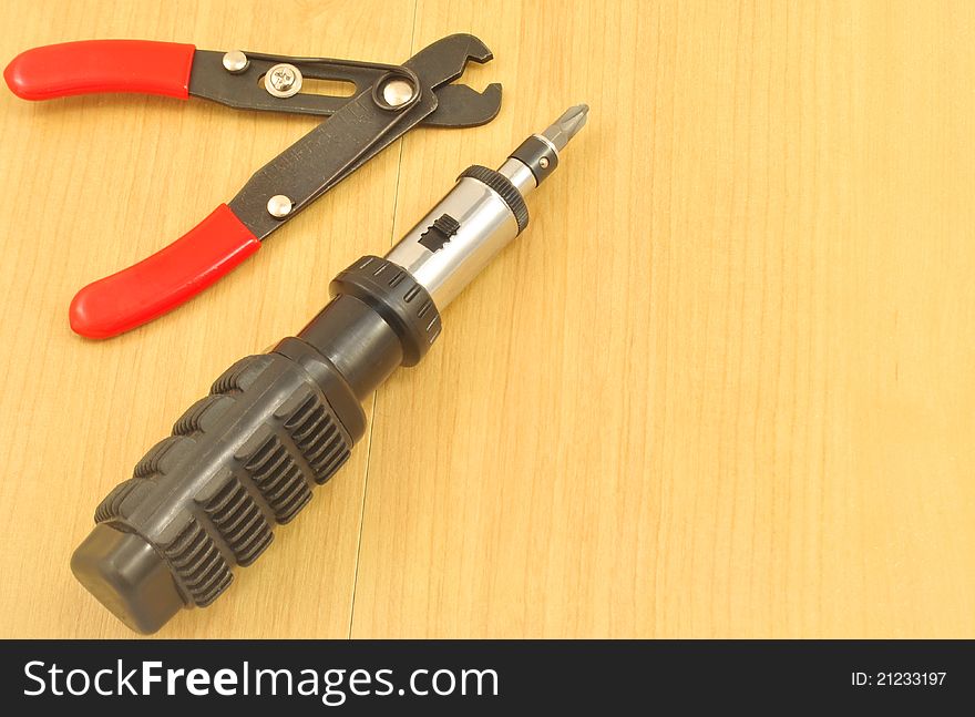 A screwdriver and wirecutter for computer
repair. A screwdriver and wirecutter for computer
repair