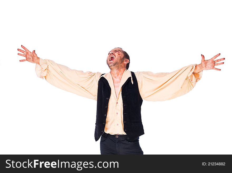 Male vampire roaring with arms raised, looking up on white background