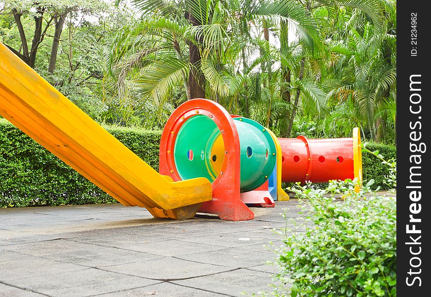 Colorful slider and tube for children in playground. Colorful slider and tube for children in playground