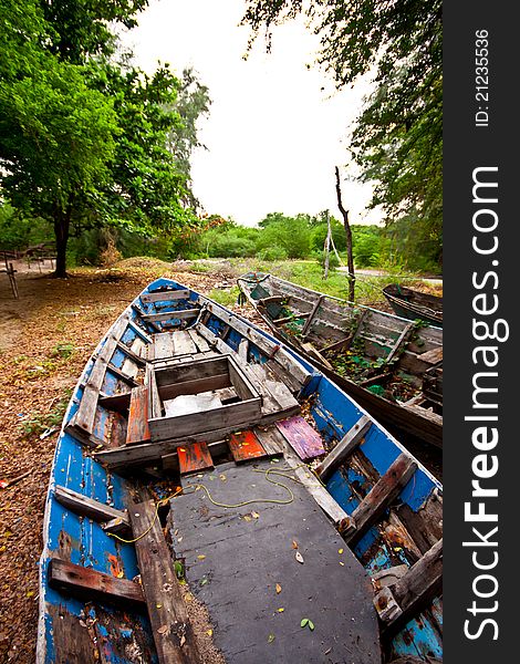 Old fishing boat on ground