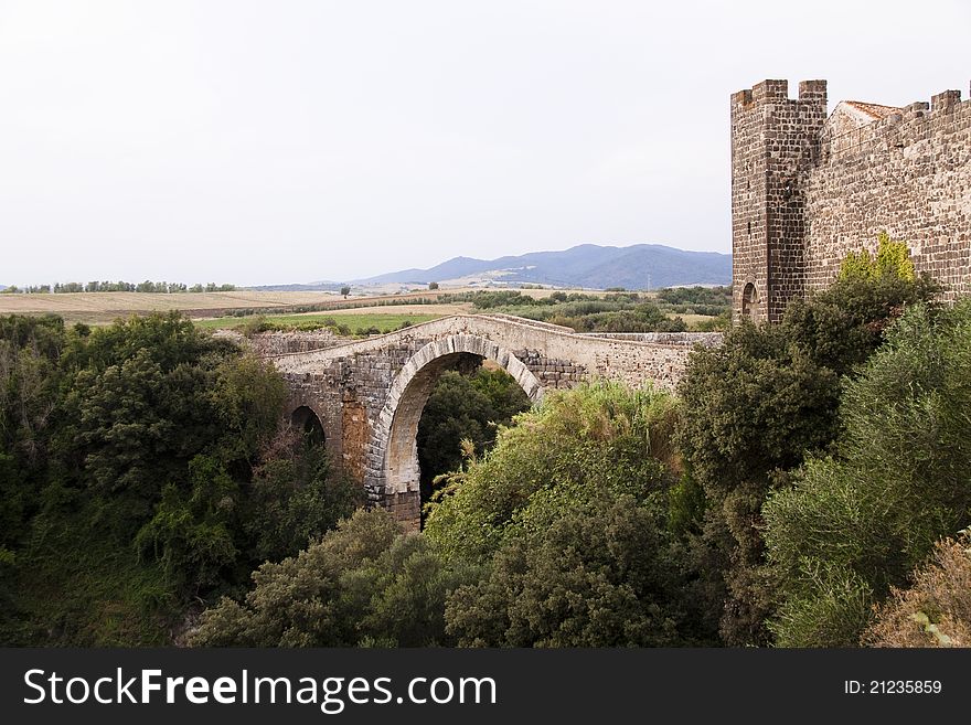 Medieval bridge located in Italy. Medieval bridge located in Italy.