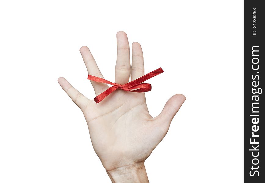 Red bow on finger on isolated background