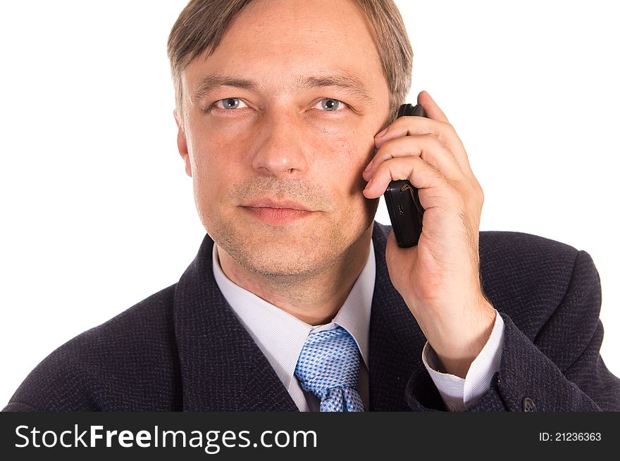 Portrait of a businessman with a phone