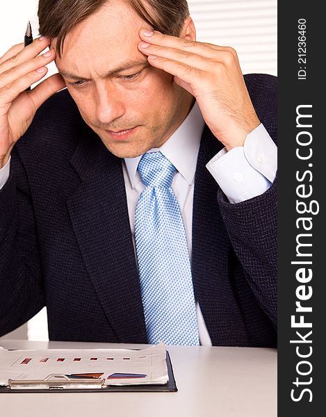 Portrait of a businessman posing at office. Portrait of a businessman posing at office