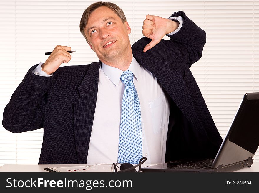 Portrait of a nice man with computer. Portrait of a nice man with computer