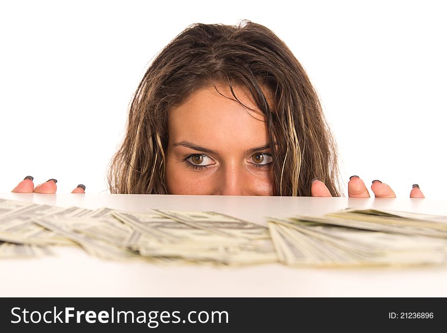 Portrait of a cute girl with money at table. Portrait of a cute girl with money at table