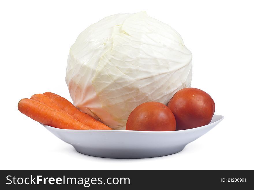 Cabbage and carrot on a white background