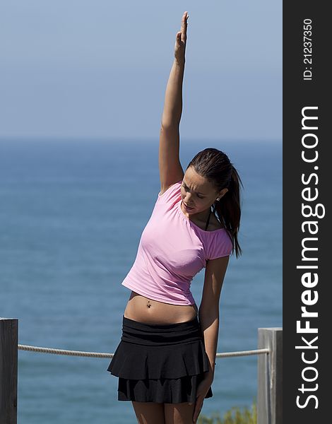 Woman making a gymnastic in a natural environmant. Woman making a gymnastic in a natural environmant