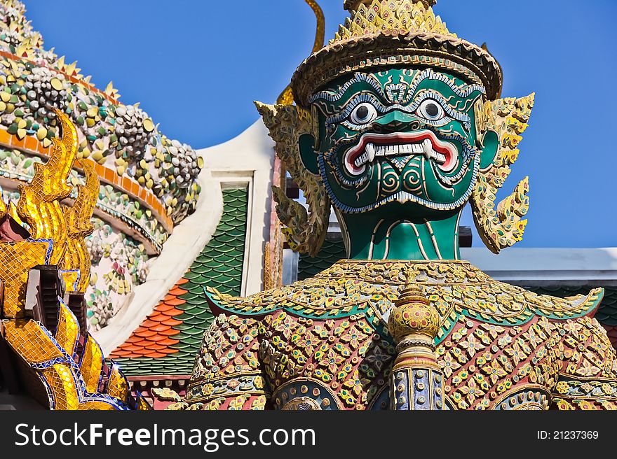 Green demon gate guardian at Wat Pra Kaew, named Intarachit. Green demon gate guardian at Wat Pra Kaew, named Intarachit