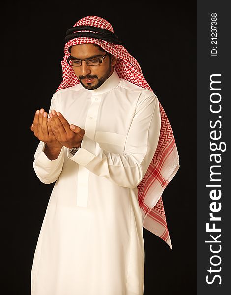 A Beautiful Arab man praying. A Beautiful Arab man praying