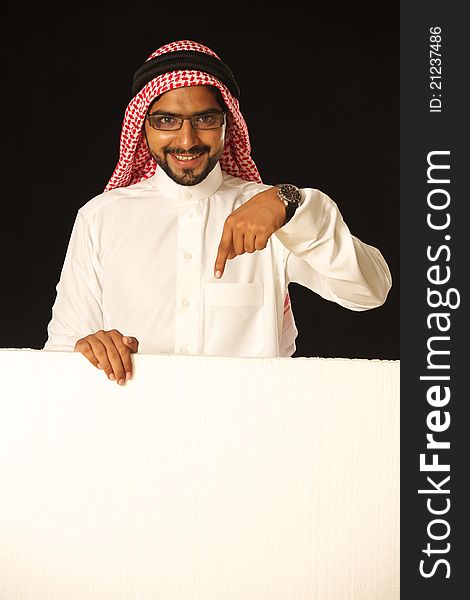Arabic male with ad space pointing. Arabic male with ad space pointing.