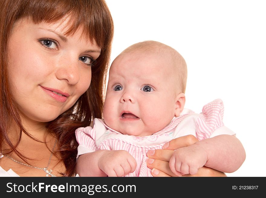 Cute mom with her baby posing on white. Cute mom with her baby posing on white