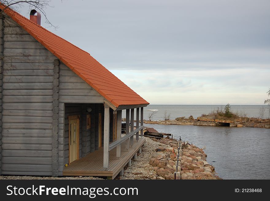 Small wooden house at the seashore. Small wooden house at the seashore