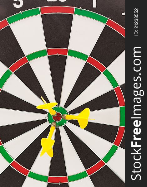 Darts hitting the bullseye