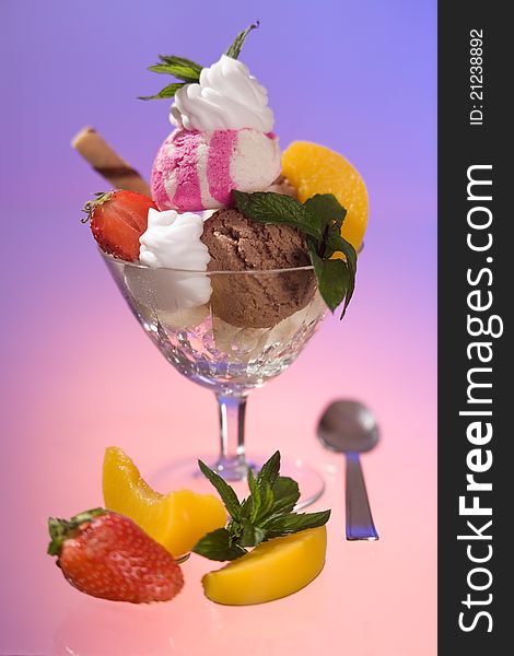 Ice cream and fruit on the glass