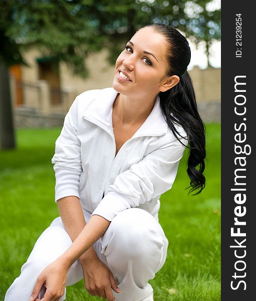 Beautiful young smiley woman at the outdoor. Beautiful young smiley woman at the outdoor