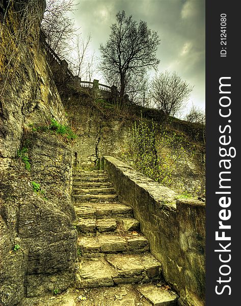 Ancient stairs with dramatic sky at background. Ancient stairs with dramatic sky at background