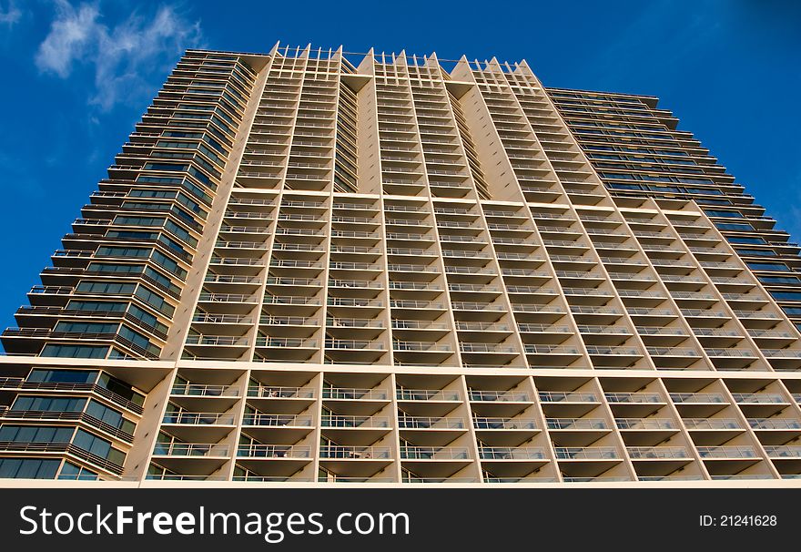 Prospective view to modern building with blue sky background