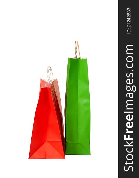 A red and a green shopping bag. A red and a green shopping bag
